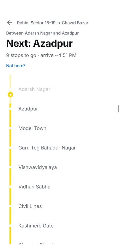 The Nazdeek app tracking a ride on the Yellow Line: it reads
                  “Between Adarsh Nagar and Azadpur, next Azadpur, 9 stops to
                  go”, then changes to “At Azadpur, next Model Town, 8 stops to
                  go” as the train pulls in.